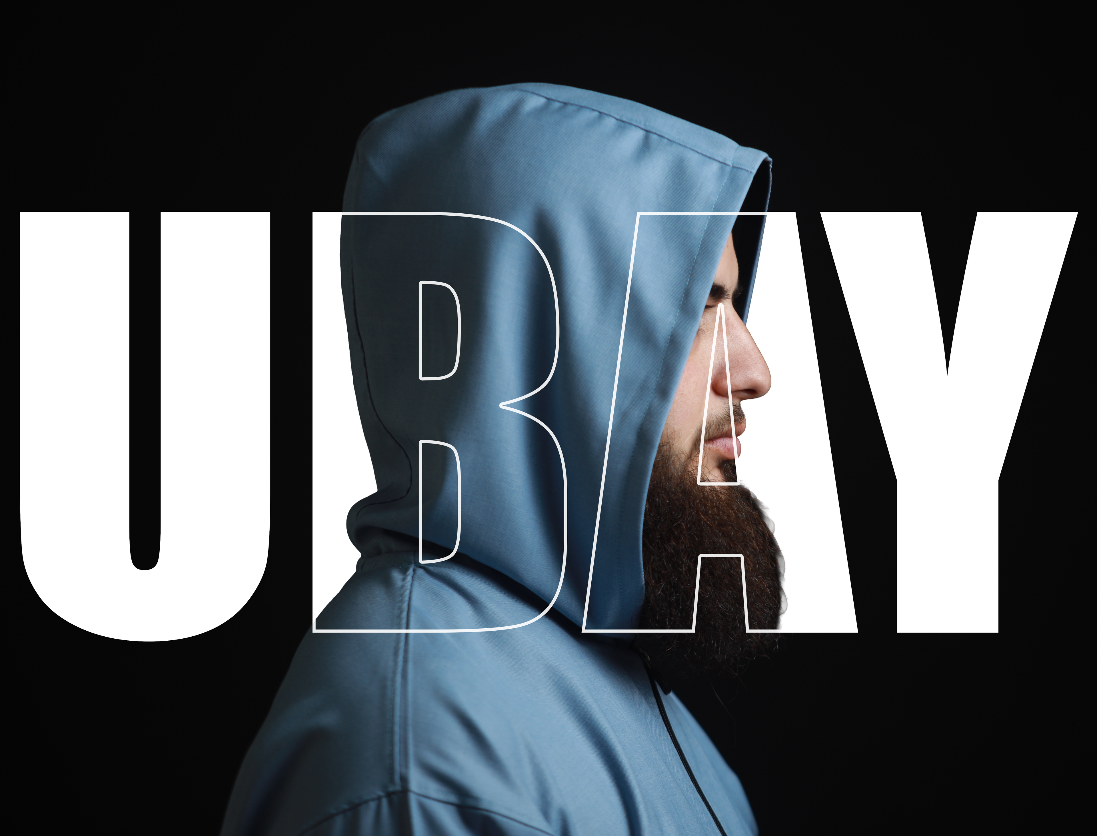 Person wearing a blue hoodie with the word 'UBAY' in bold letters.